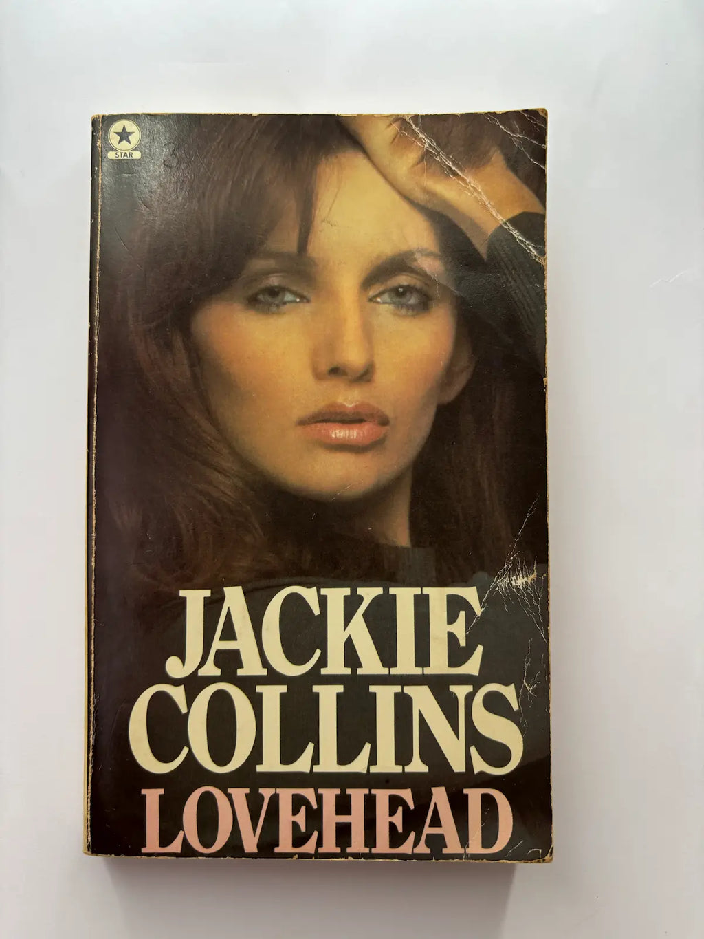 Lovehead by Jackie Collins romantic suspense book front cover UK