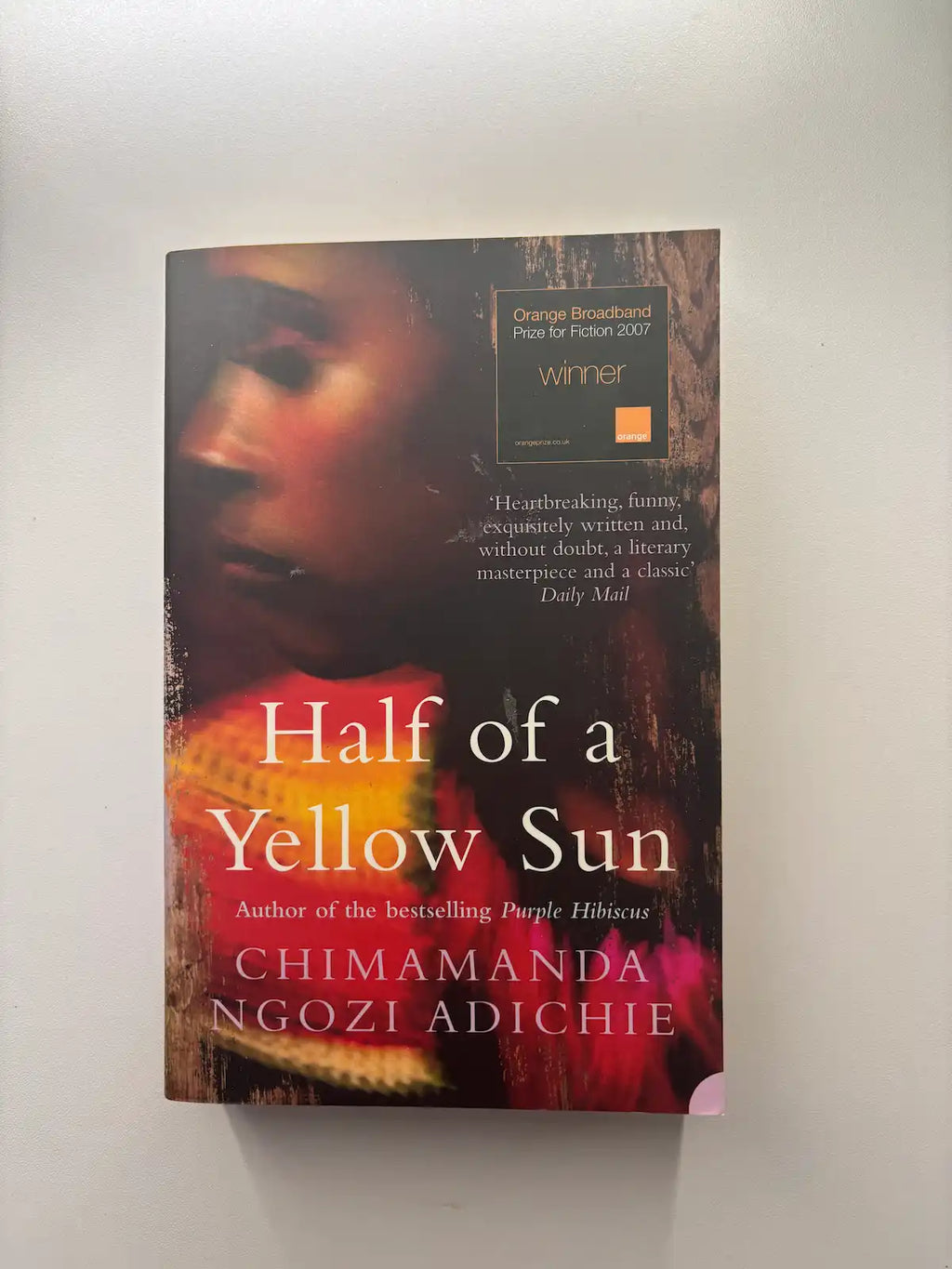 Half of a Yellow Sun by Chimamanda Ngozi Adichie historical fiction book front cover UK