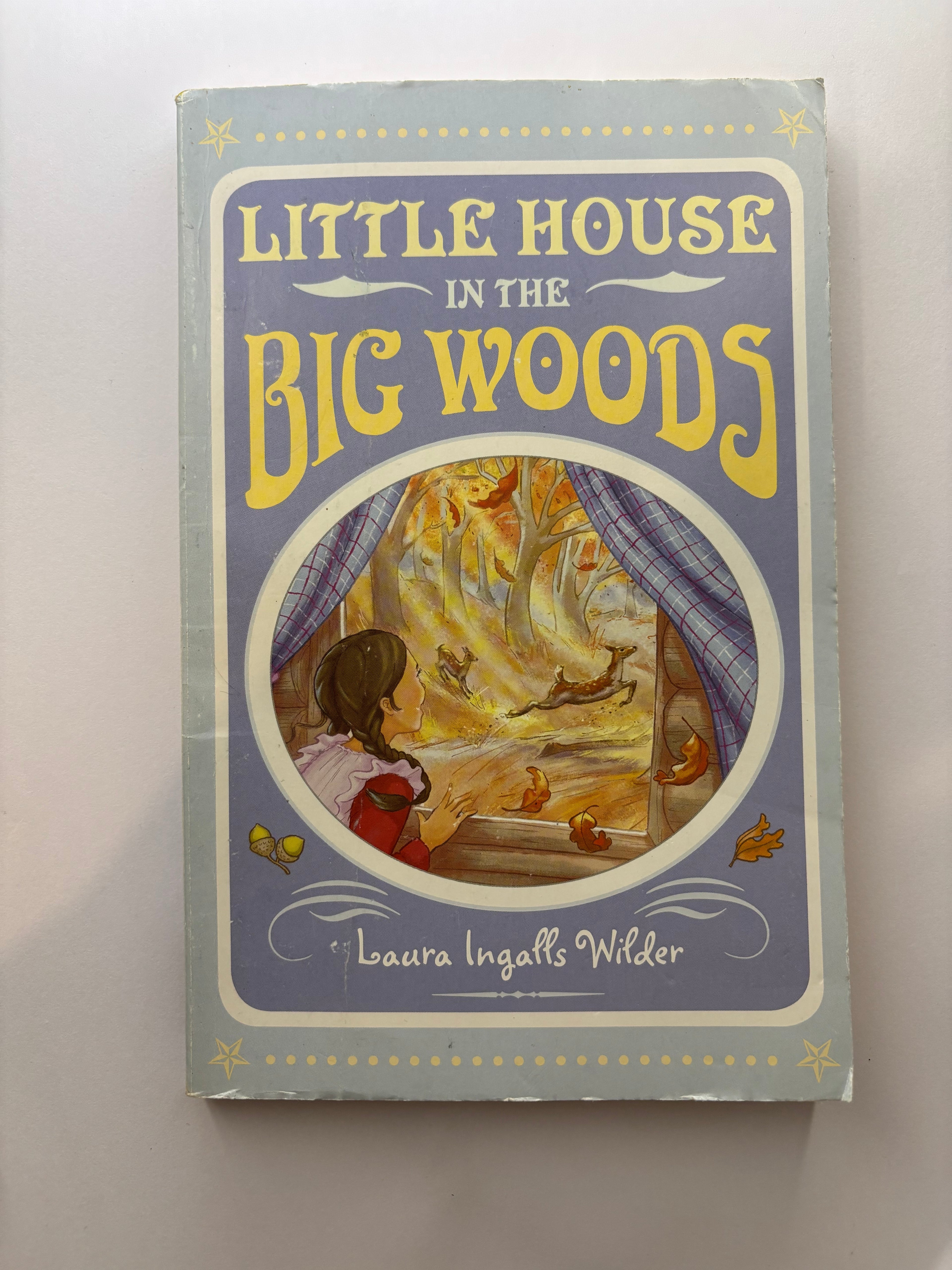 Little house in the big woods by Laura Ingalls Wilder