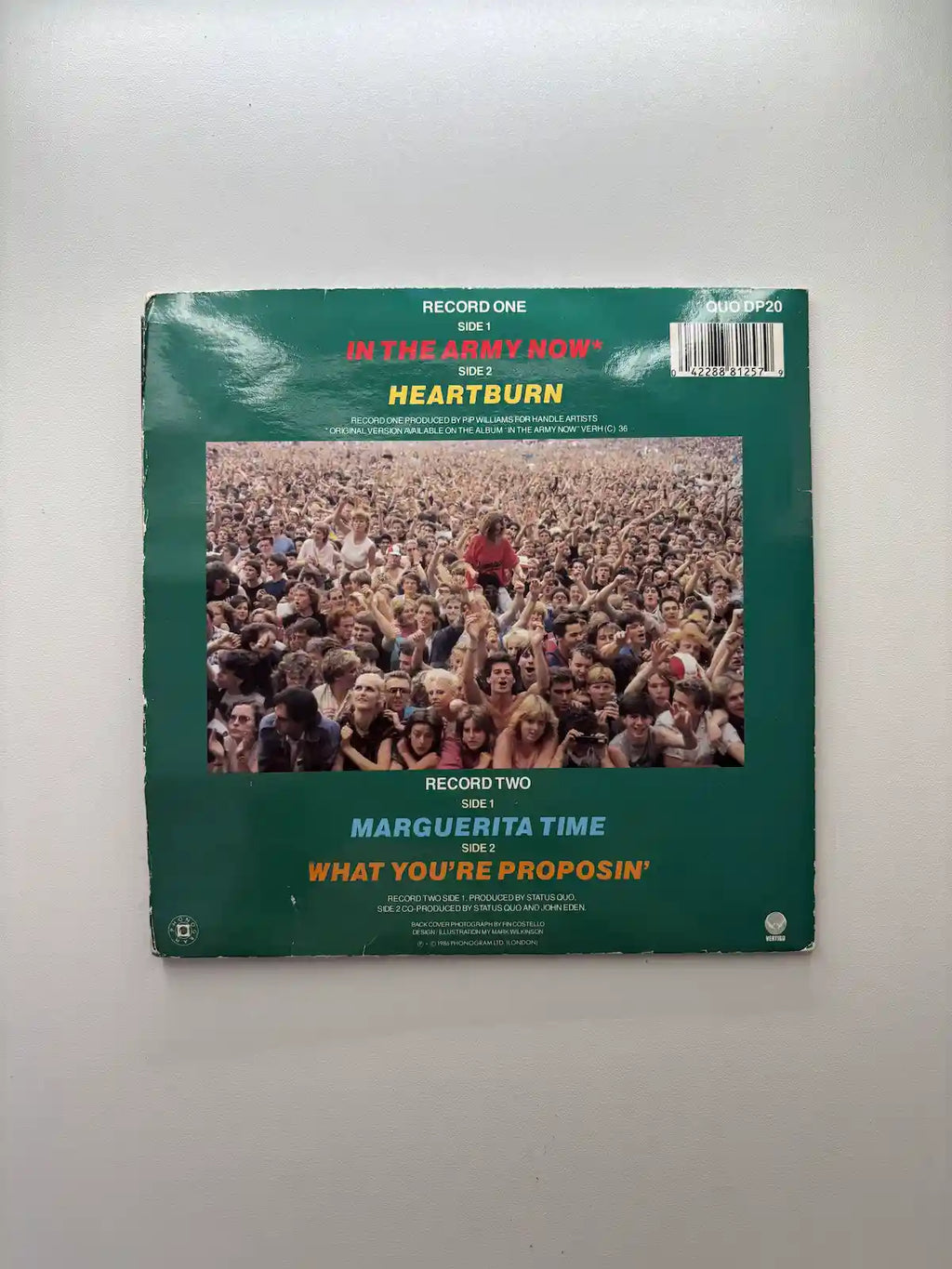 Status Quo In the Army Now vinyl single back cover track listing 1986 UK