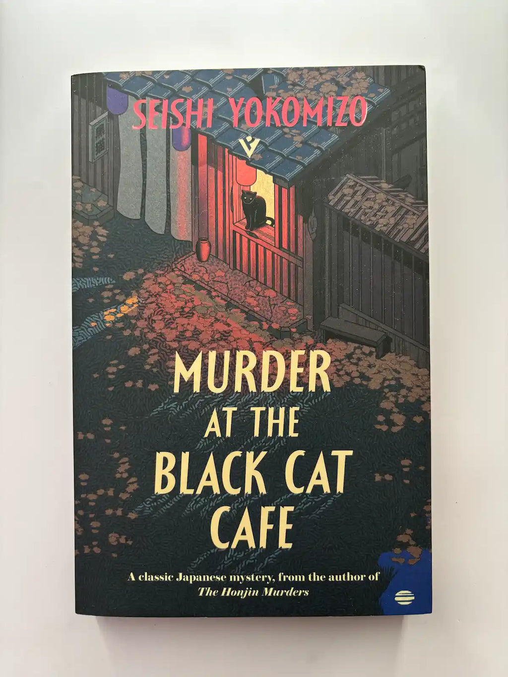 Murder at the Black Cat Cafe by Seishi Yokomizo Japanese mystery novel front cover 