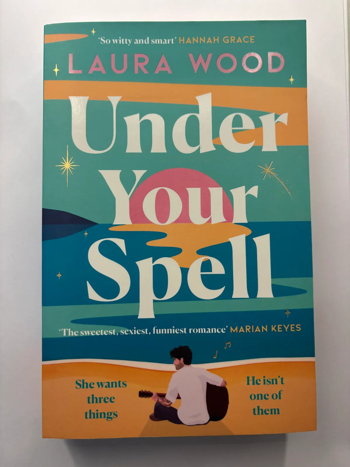 Under Your Spell by Laura Wood romance book front cover UK